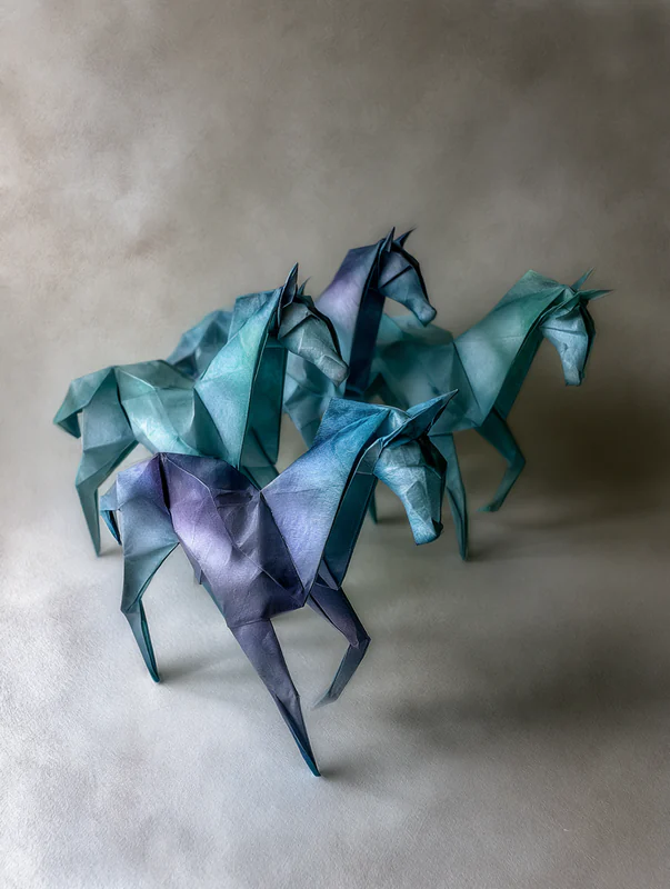 Origami horse herd in shades of teal